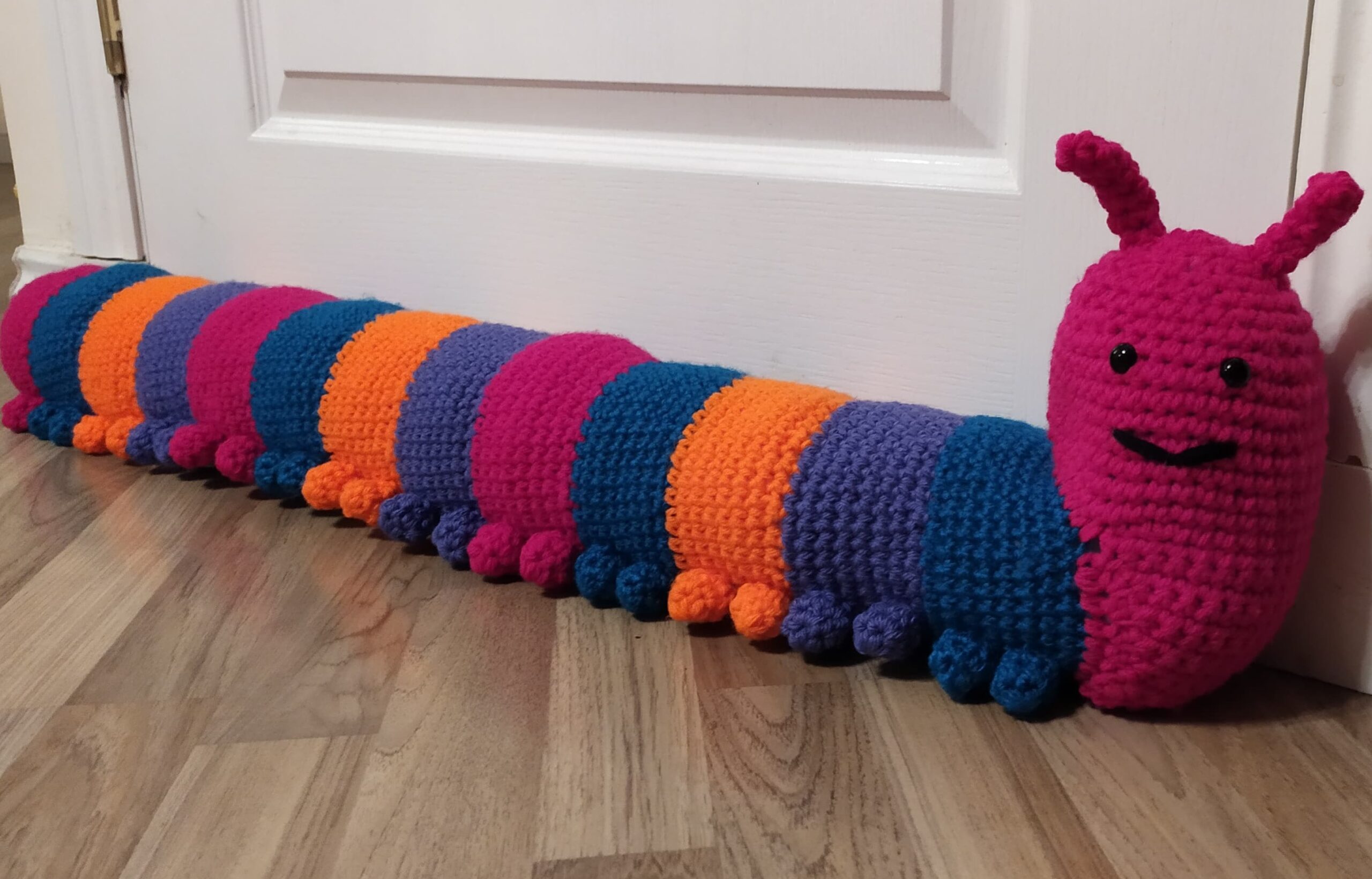 Cosy Cost-Saving Caterpillar Draught Excluder